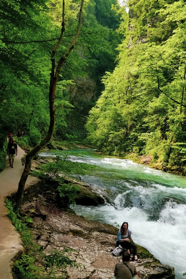 clambering down to take pictures along the river at vintgar gorge gorje