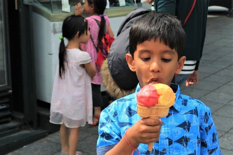 Our elder one relishing Double Cone Ice-cream at Jacques Cartier Plaza.