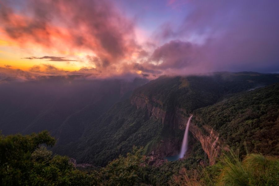 sunset over nohkalikai falls meghalaya