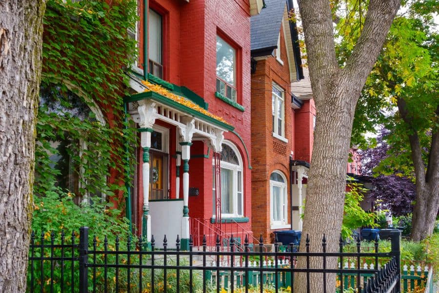 row of colorful victorian houses kensigton market toronto cultural experiences canada