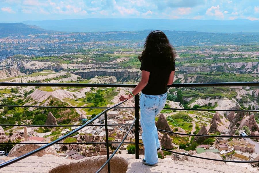 mini-me enjoying view over cappadocia from uchisar castle viewpoint