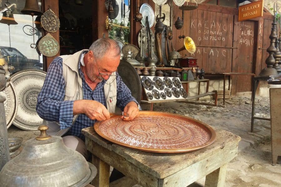 an artisan at a shop in the old bazaar tarihi demirciler carsisi safranbolu
