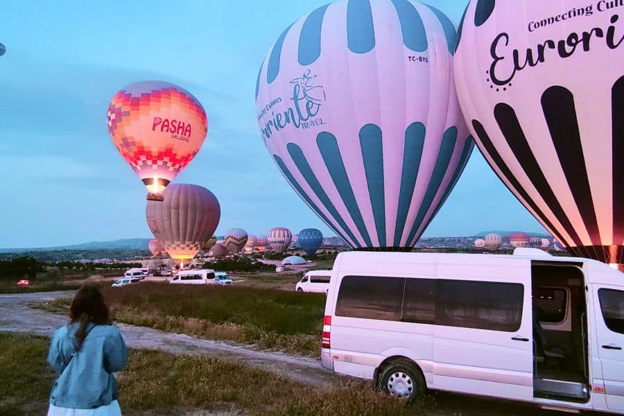 preparation for a hot air balloon ride at a take off site in cappadocia