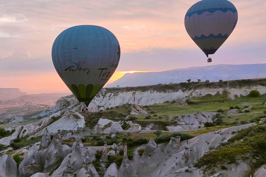 hot air balloons in cappadocia at sunrise