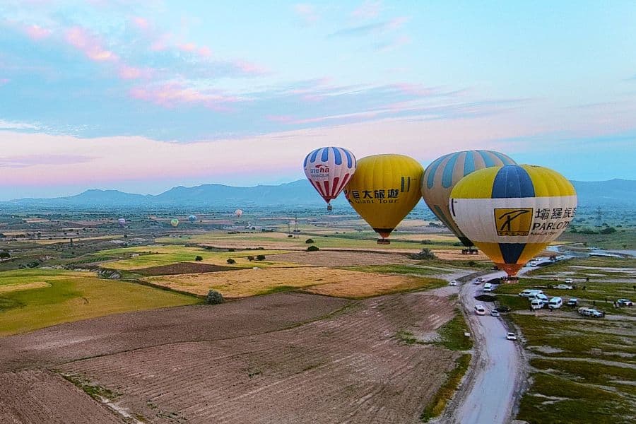 hot air balloons taking off ready to fly high in the cappadocian sky