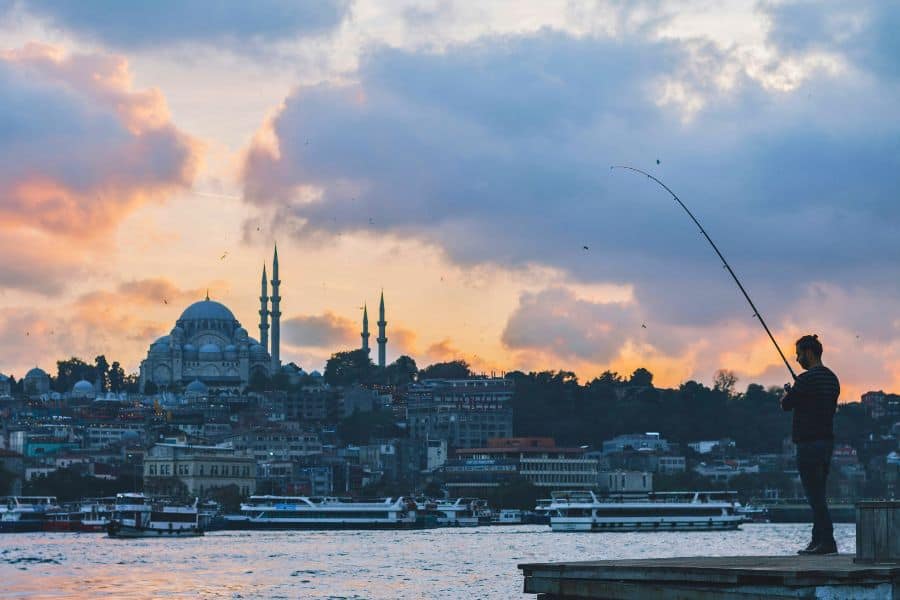istanbul skyline and a fisherman turkey turkiye most visited countries world
