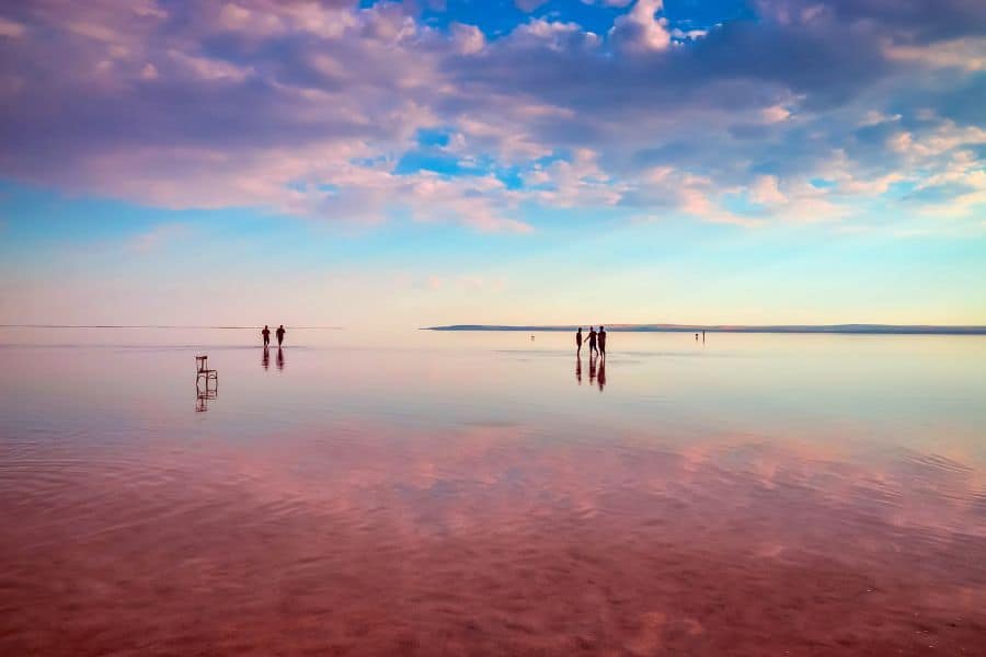 tourists enjoying the pink lake tuz golu in sereflikochisar near cappadocia
