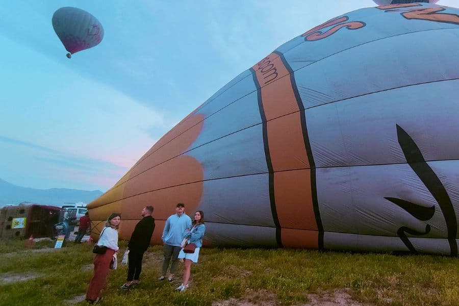 preparing a hot air balloon for the ride at a take off site cappadocia