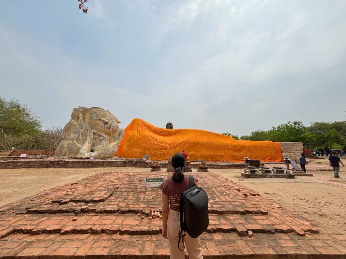huge statue of reclining buddha at wat lokkayasutha in ayutthaya