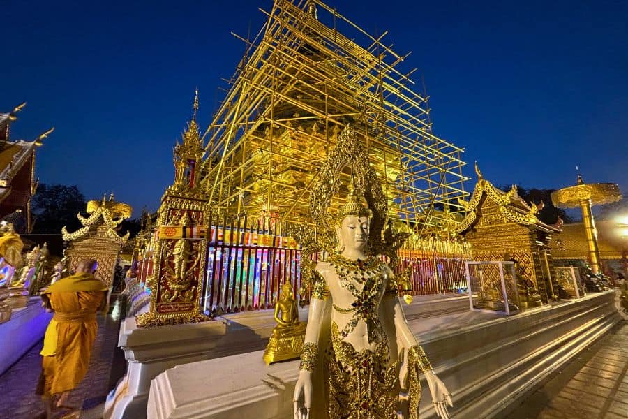 under renovation gold chedi or pagoda housing a holy relic at wat phra that doi suthep in chiang mai