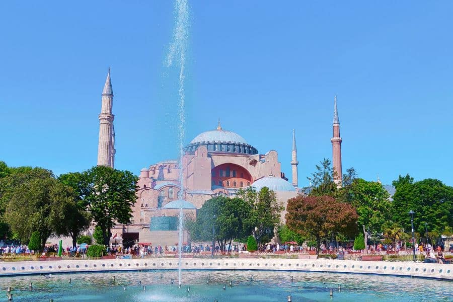 hagia sophia with a fountain in the foreground on a clear day in sultanahmet neighborhood in istanbul