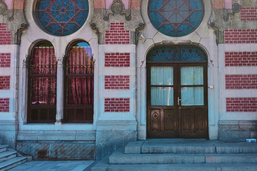 entrance of sirkeci railway station in istanbul with arched windows and ornate designs