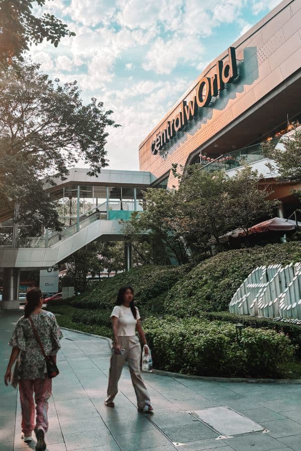 people walking outside the shopping mall of centralworld in siam-pathumwan in bangkok