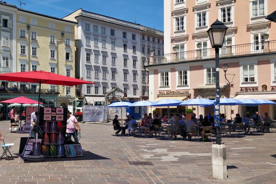 alter markt aka old market in salzburg showcasing the stalls and cafes with outdoor seating