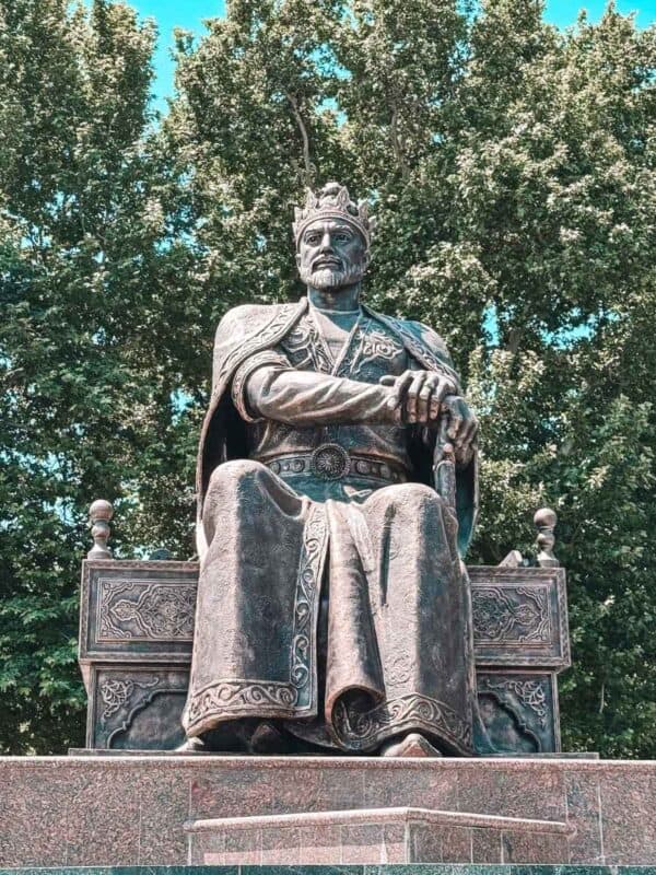 amir timur statue in samarkand surrounded by trees