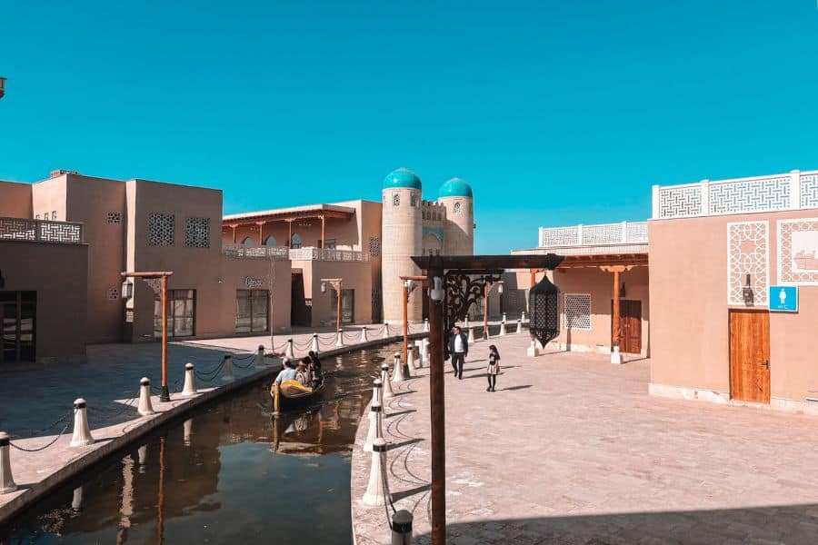 arda khiva tourist complex with canal boat ride and traditional style buildings near khiva