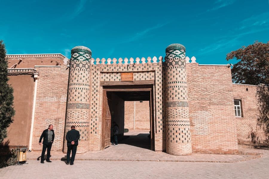 entrance gate of nurullaboy palace khiva with decorative brick towers and entrance arch