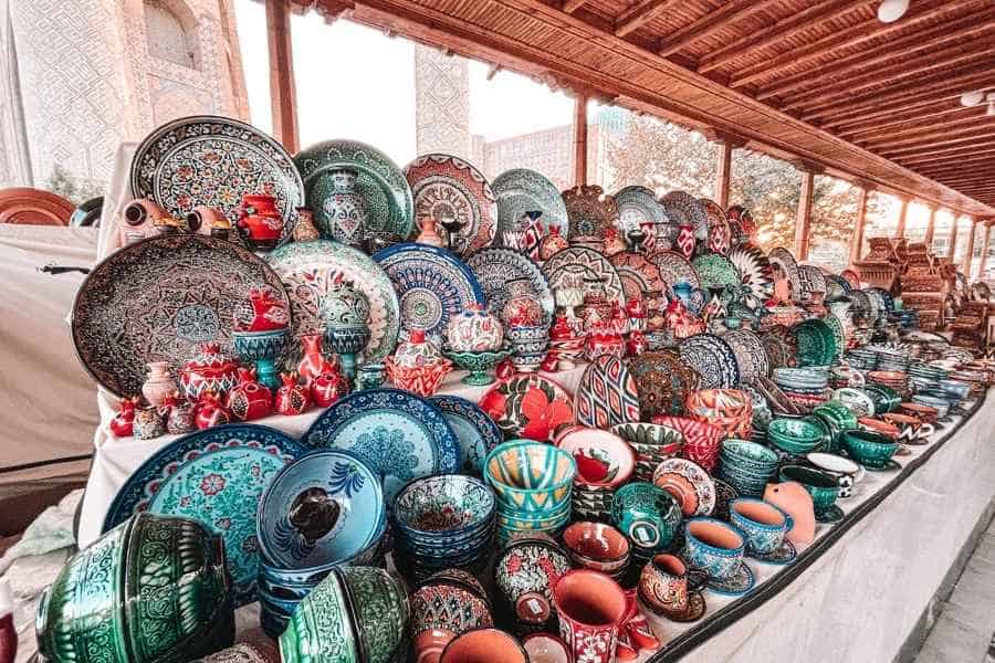 hand painted uzbek ceramic plates and bowls at siyob market