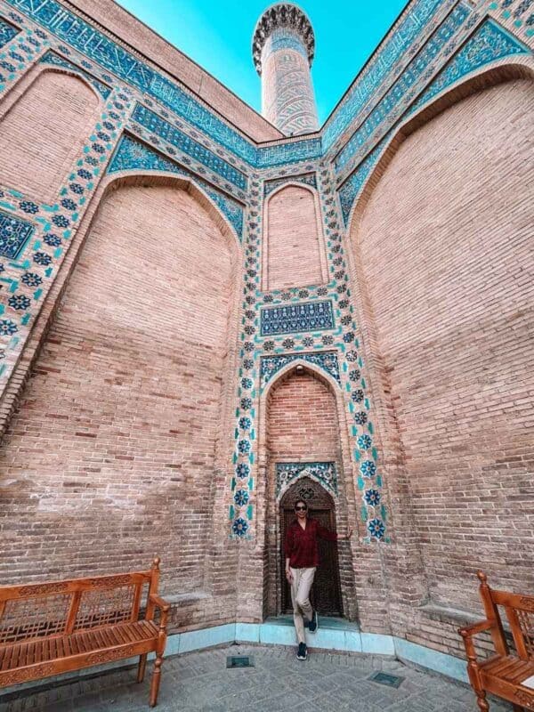 inner courtyard corner of gur-e-amir mausoleum with tiled arches