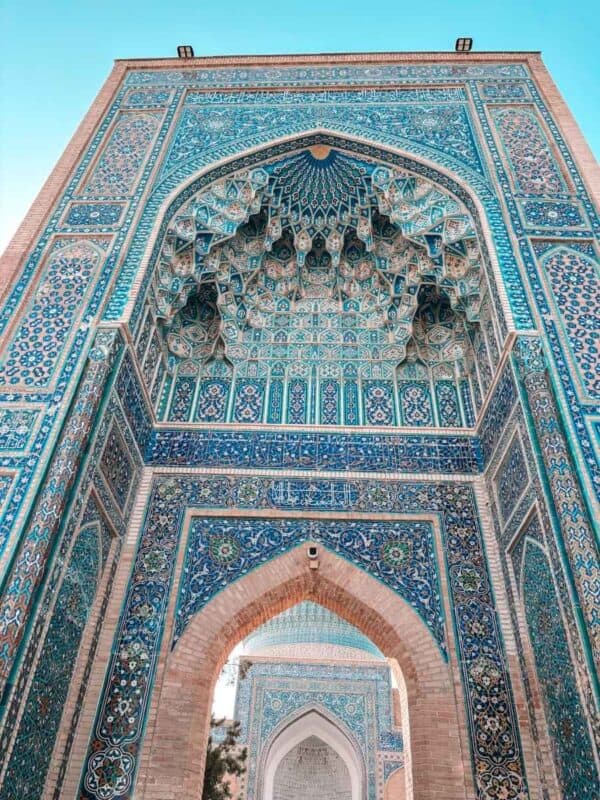 intricate muqarnas and blue tilework inside gur-e-amir mausoleum