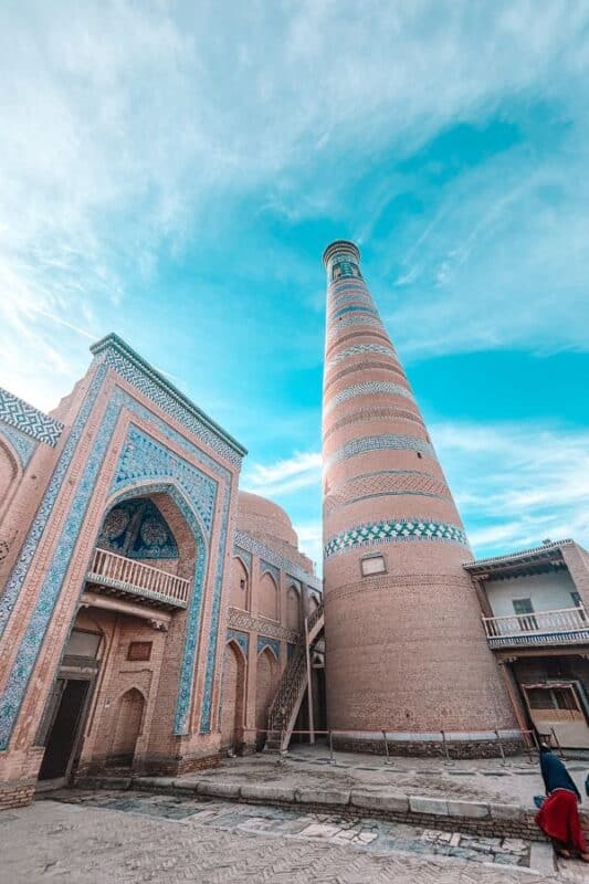 islam khoja minaret and madrasa khiva with tiled facade and brick tower