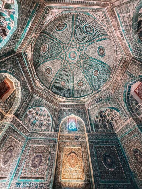intricate turquoise and jade tiled dome ceiling of shodi mulk oko mausoleum at shah i zinda samarkand