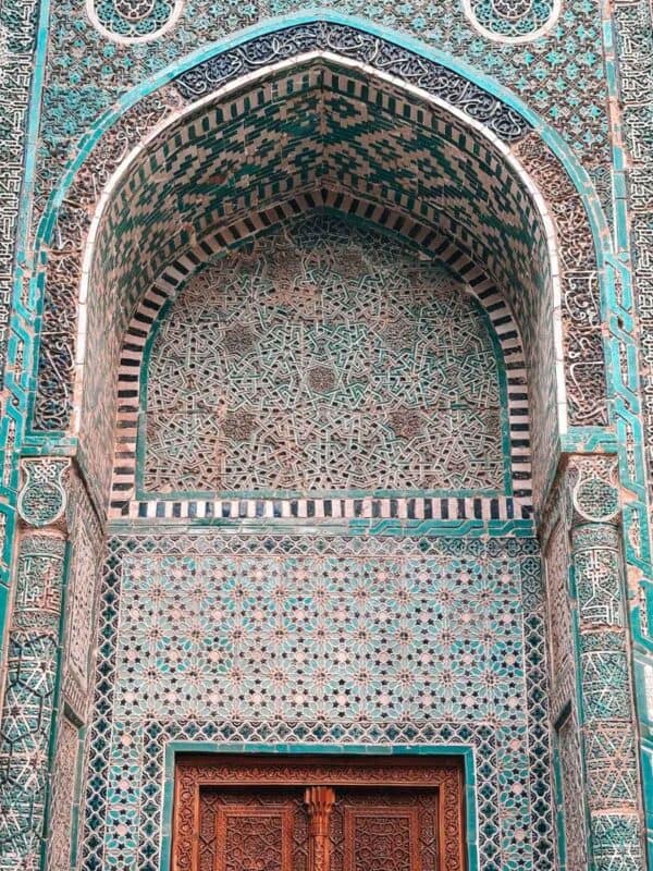 ornate turquoise tiled iwan with geometric patterns of khodja ahmed mausoleum at shah i zinda samarkand 