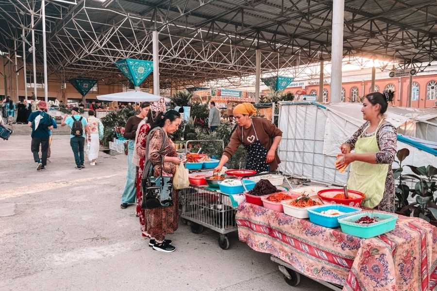 vendors selling colorful pickles and salads inside siyob bazaar