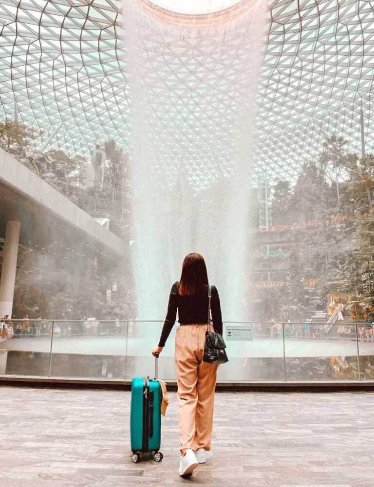 girl posing with her back towards the camera on changi singapore airport