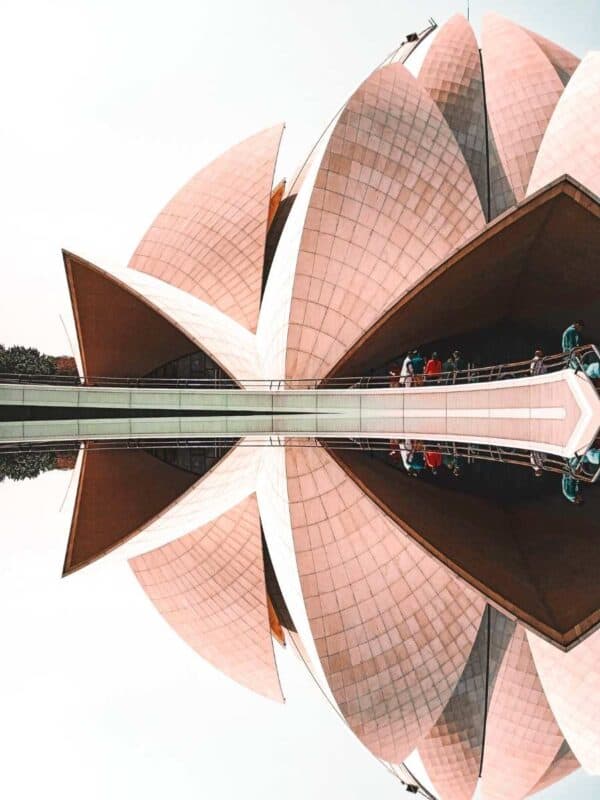 close-up view of the lotus temple in delhi with reflection on a glassy surface