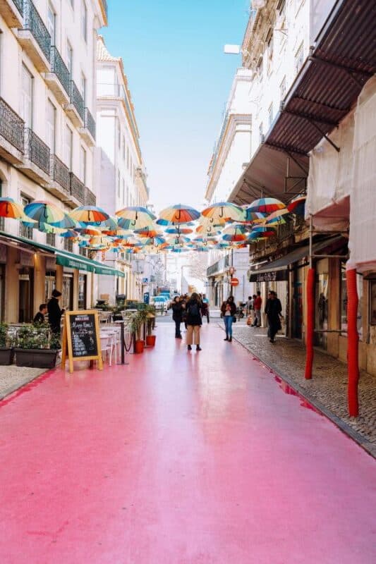 agueda lisbon's pink umbrella street portugal