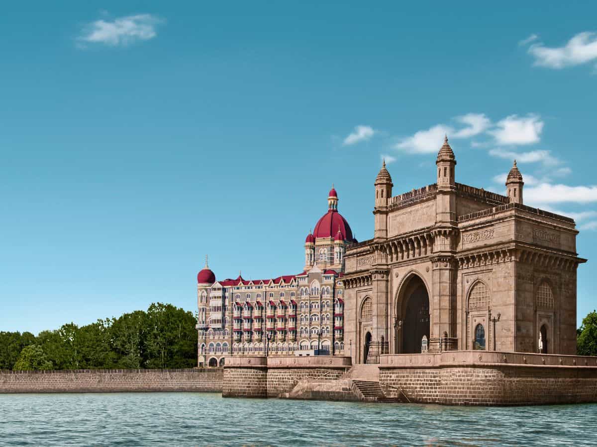 gateway of india and taj mahal palace hotel in mumbai overlooking the arabian sea