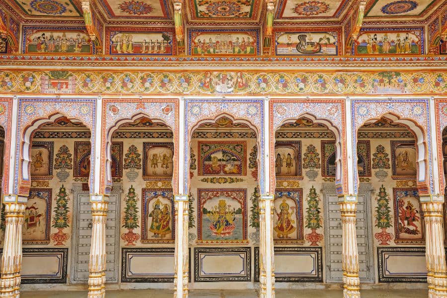 painted arches and frescoed walls inside podar haveli in nawalgarh shekhawati rajasthan