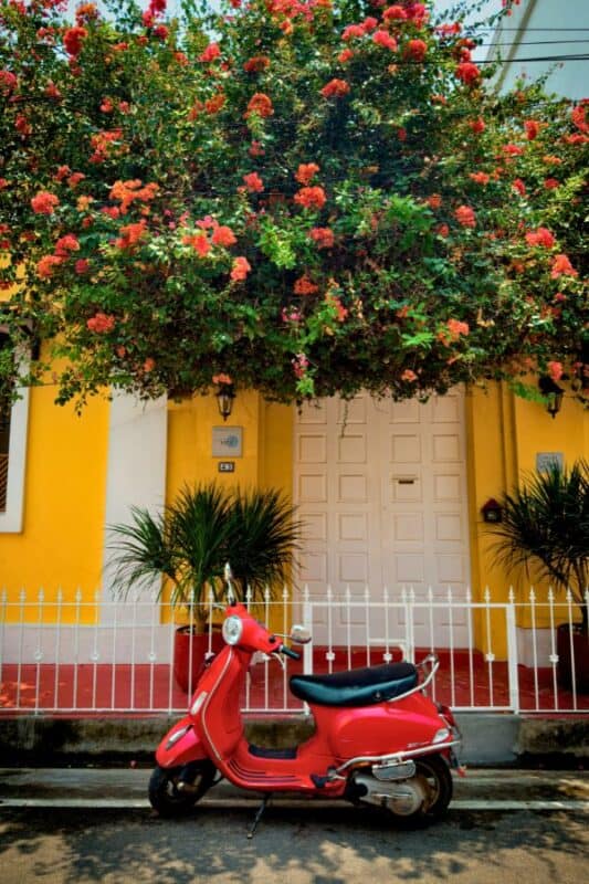 pondicherry french quarter yellow colonial house red scooter