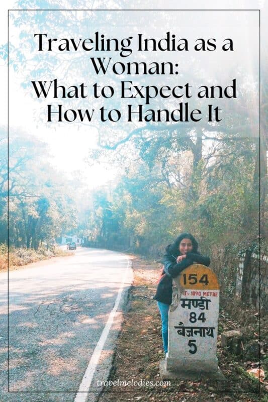 traveling india as a woman pin with female traveler standing by roadside milestone in india with text overlay about what to expect and how to handle it