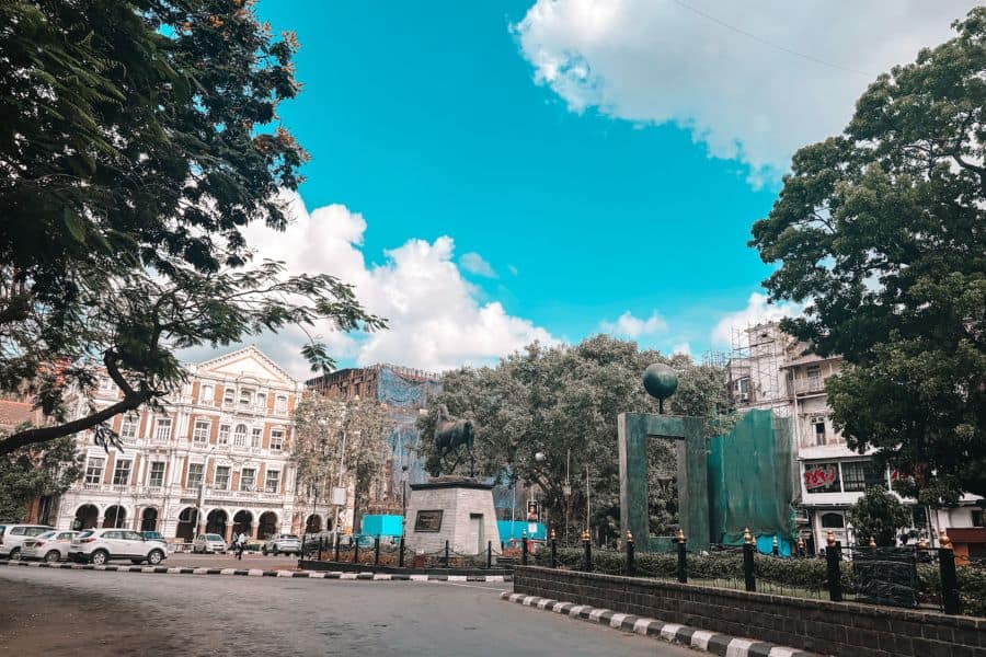 The Kala Ghoda (black horse) statue at the heart of the Kala Ghoda art district in Fort, South Mumbai, with the Army & Navy Building visible behind it