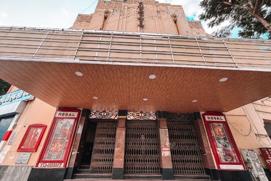 The Art Deco facade of Regal Cinema in Colaba, South Mumbai, designed by Charles Stevens and opened in 1933, one of India's first air-conditioned cinemas and a defining example of Bombay Art Deco architecture